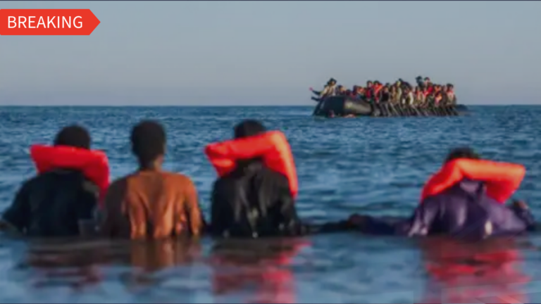 illegal immigrants in water channel on life jacket
